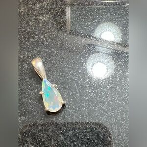 Pear shaped opal pendant in sterling silver